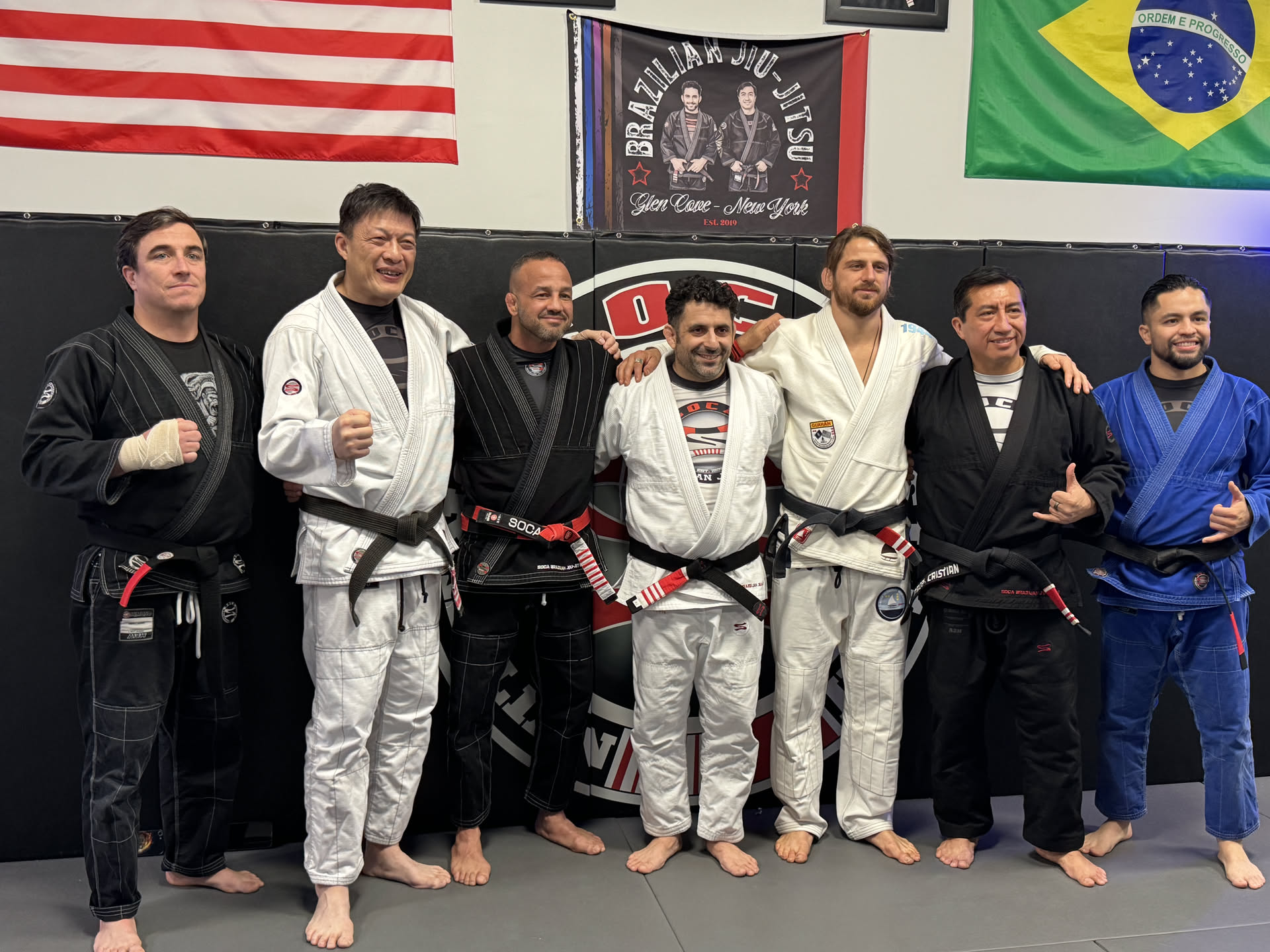 Professor Jonnathan Armijos — Standing with the staff