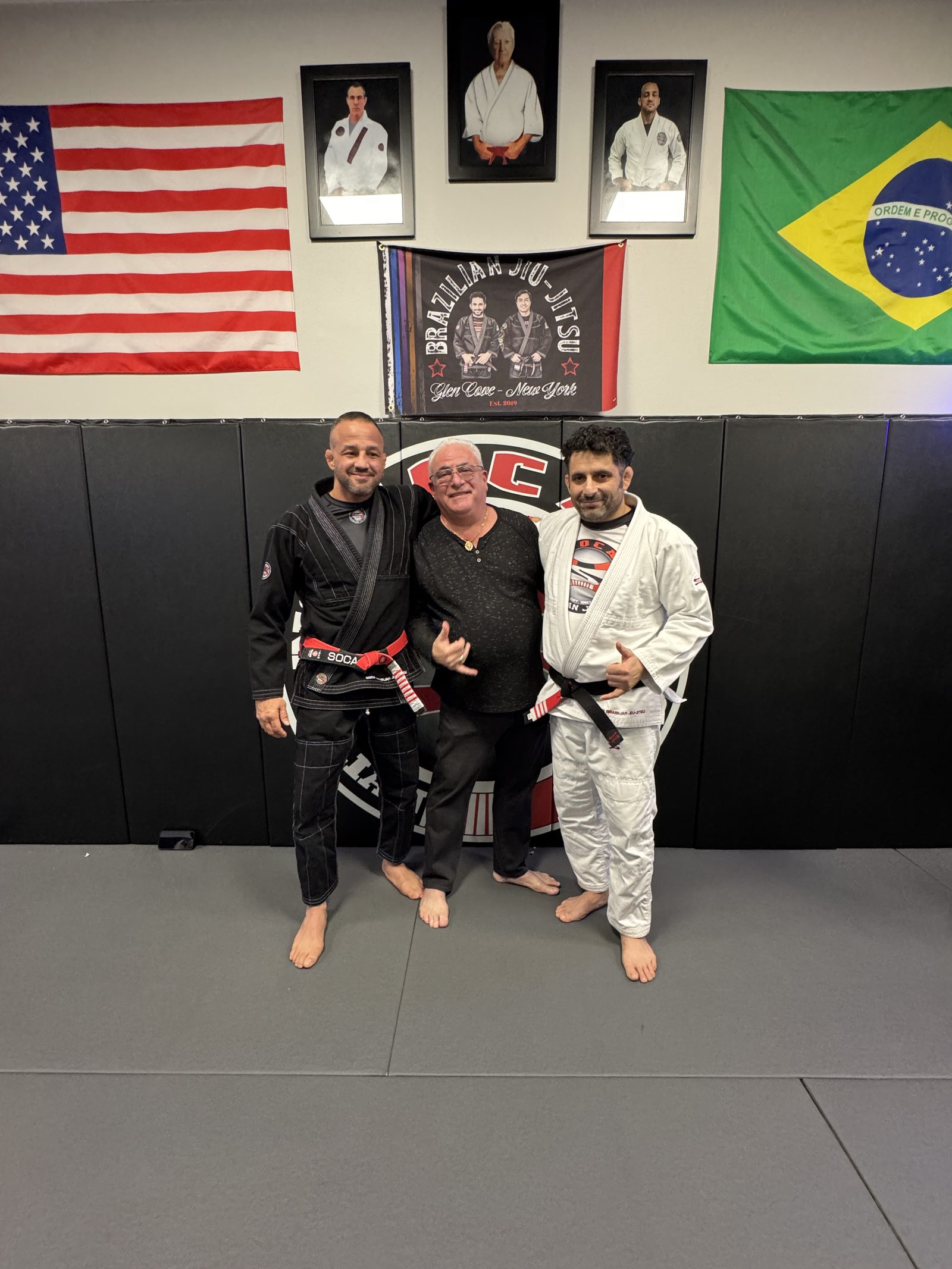 With Master Soca in front of the Soca BJJ banner